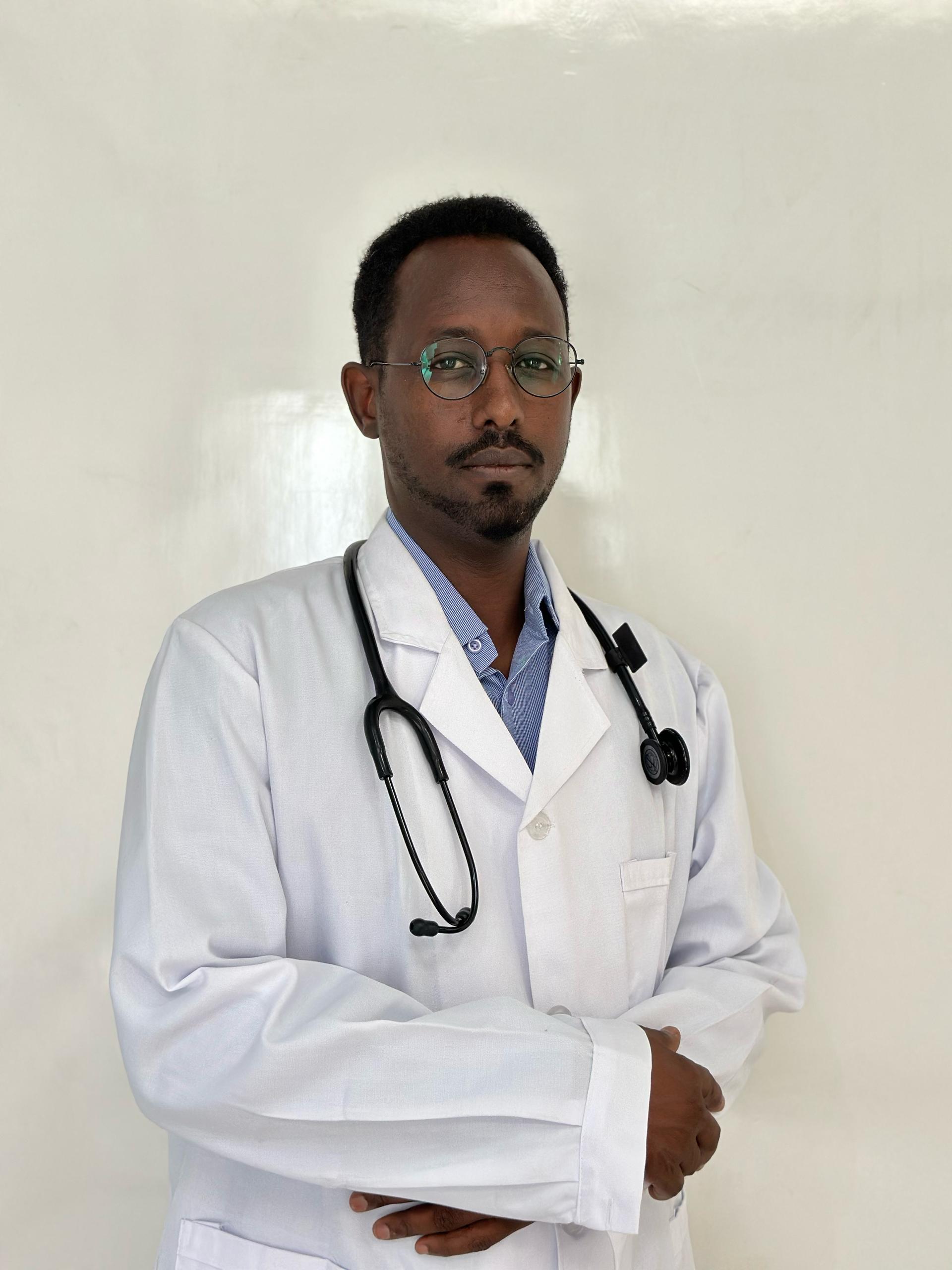 Male doctor with a family, parents and child